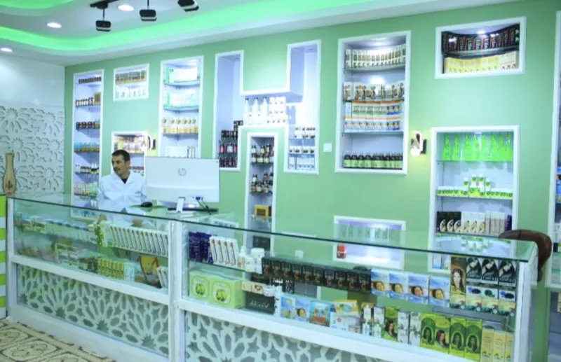 The Luqman Herbal Center pharmacy counter and shelves